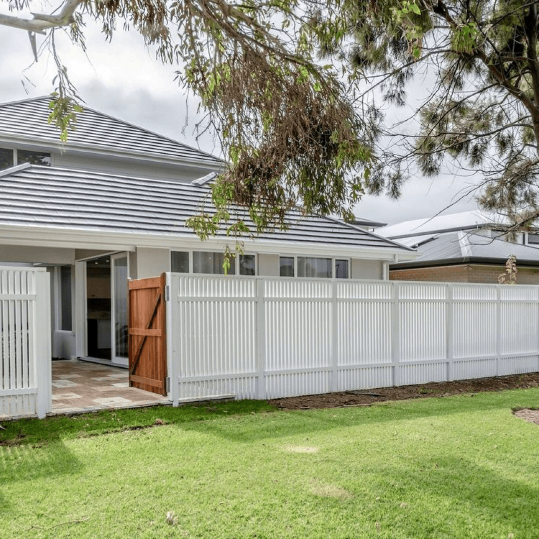 Two-story home with a fenced yard