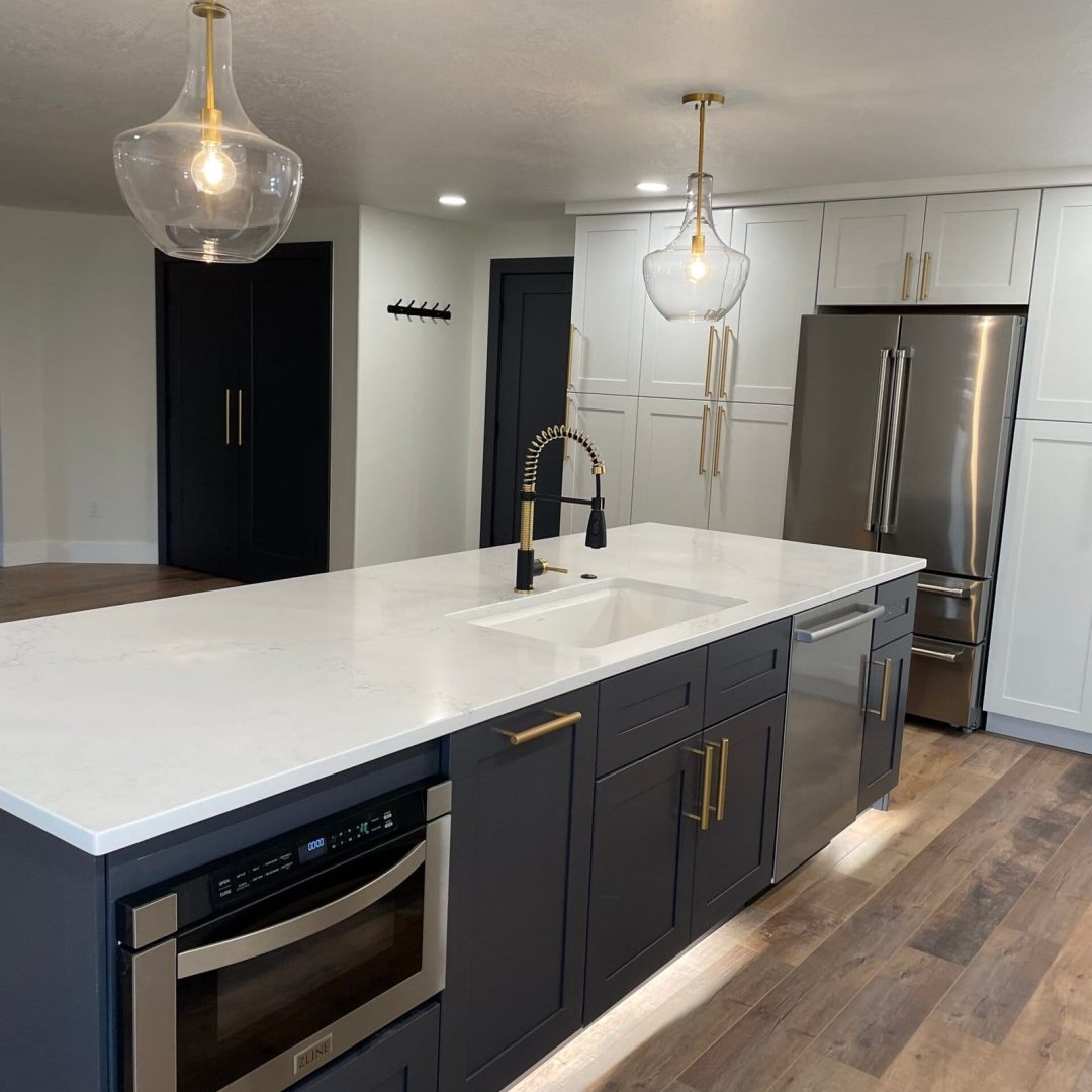 Two-tone kitchen with a large island